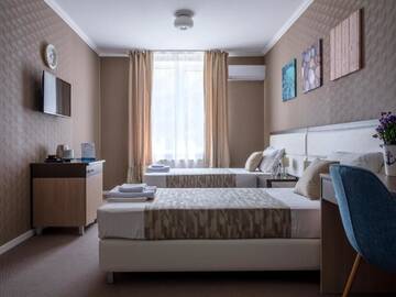 Стандартный семейный номер в Гостинице РОТА Chalet Марина 3*
